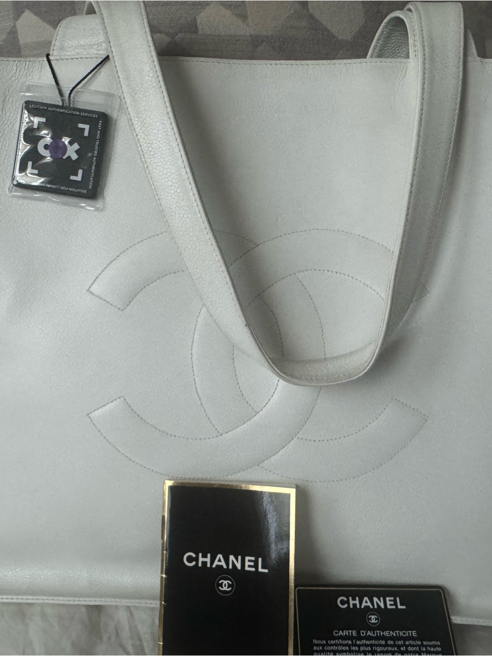 Authentic CHANEL White Leather Tote with Embossed CC Logo - Picture 2 of 6